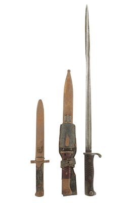 A COLLECTION OF THREE WW1/WW2 STEEL BAYONETS comprising a long tapering steel example with 