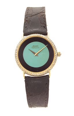 A GENTLEMAN'S 18CT GOLD AND DIAMOND SET PIAGET AUTOMATIC WRISTWATCH, on original black 