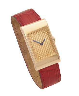 A 1960'S 18CT GOLD BUCHERON MANUAL WIND WRISTWATCH on the original red crocodile leather strap 