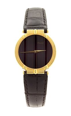 A LADIES 18CT GOLD PIAGET "POLO" WRISTWATCH, on a black crocodile leather strap with 18ct gold 