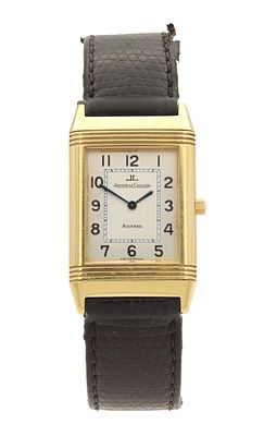 A GENTLEMAN'S 18CT GOLD JAEGER-LECOULTRE REVERSO WRISTWATCH on lizard skin strap with original 
