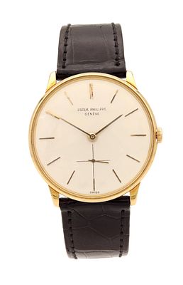 A GENTLEMAN'S VINTAGE 18CT GOLD PATEK PHILIPPE MANUAL WIND WRISTWATCH on Patek Philippe 