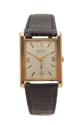 A MID 20TH CENTURY ROLLED GOLD GRUEN PRECISION WRISTWATCH the rectangular case enclosing a 