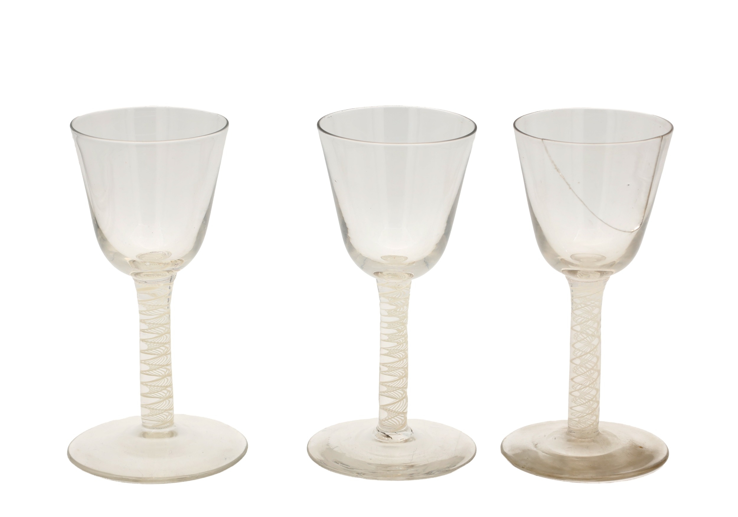 THREE 18TH/19TH CENTURY ENGLISH GLASS WINE GLASSES WITH OPAQUE TWIST STEMS each