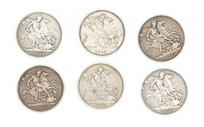 A COLLECTION OF SIX VICTORIAN SILVER CROWNS dated 1887, 1889, 1894 and 1897, each with St 