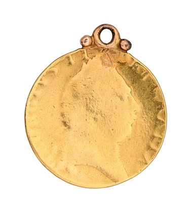 A GEORGE III SPADE GUINEA with a 9ct rose gold surmount, minted between 1787 and 1799; the date 