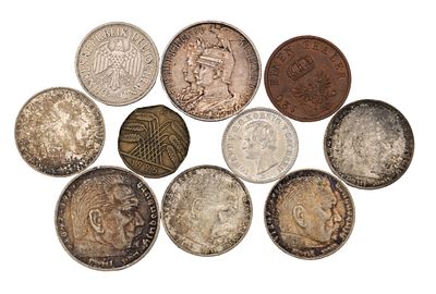 A COLLECTION OF TEN GERMAN COINS comprising three 5 Reichsmark Hindenburg pieces; a 1925 
