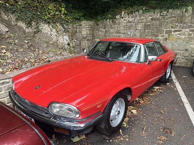 A CIRCA 1984-85 JAGUAR XJ-S HE 5.3-LITRE V12 COUP&Eacute; finished in red with twin gold 