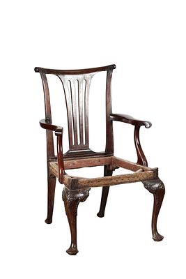 A GEORGE III MAHOGANY CHIPPENDALE STYLE OPEN ARMCHAIR having a shaped top rail above a pierced 