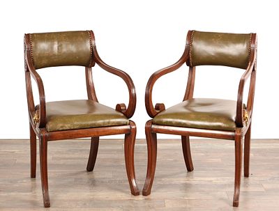 A FINE PAIR OF REGENCY MAHOGANY DESK CHAIRS ATTRIBUTED TO THOMAS HOPE with padded green leather 