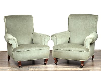 A PAIR OF LATE 19TH CENTURY UPHOLSTERED WALNUT ARMCHAIRS having high backs, scroll arms and 