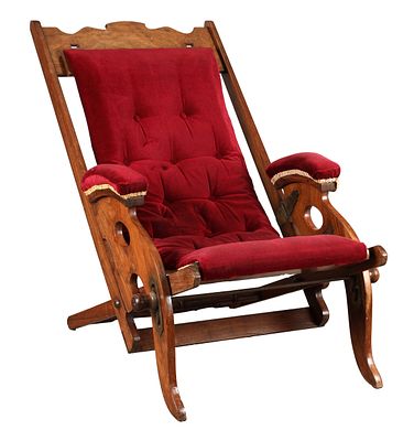A RARE 19TH CENTURY CHAMFER WOOD ADJUSTABLE FOLDING CAMPAIGN CHAIR with a shaped crest rail 