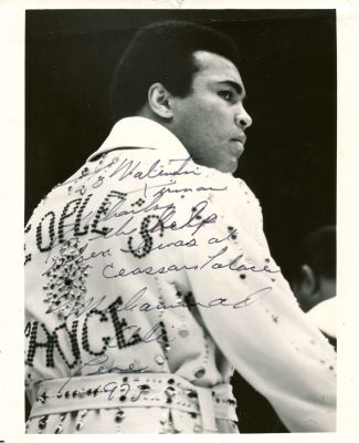 ALI MUHAMMAD: (1942-2016). <span style="font-size: 11.0pt; line-height: 107%; font-family: 