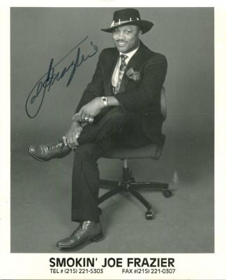 FRAZIER JOE: (1944-2011). <span style="font-size: 11.0pt; line-height: 107%; font-family: 