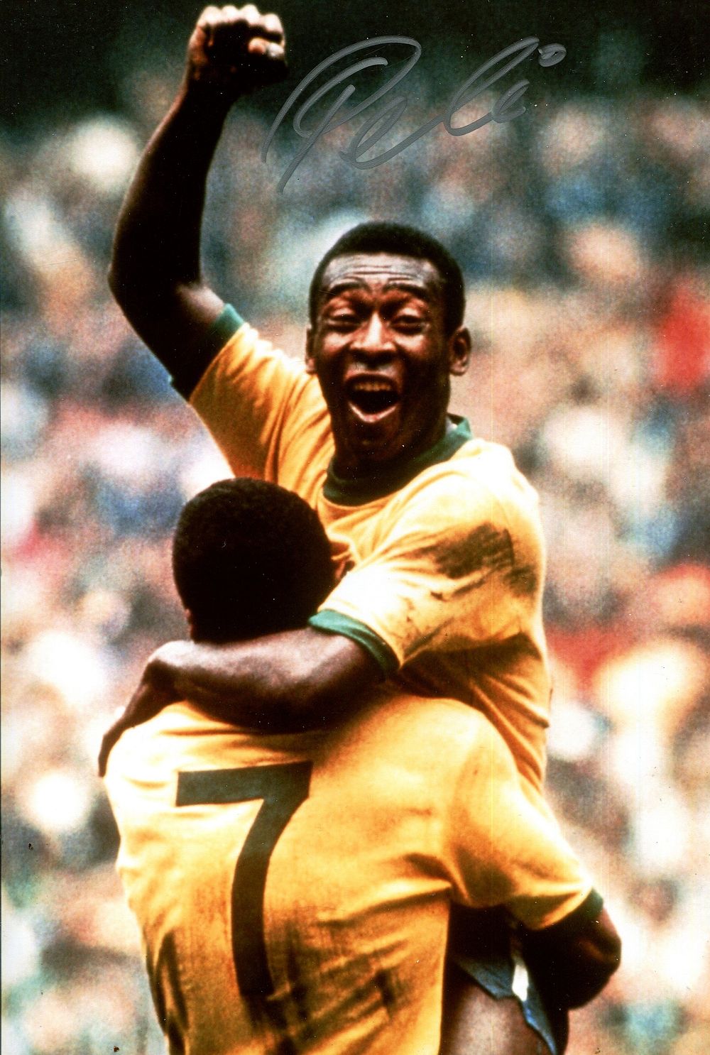 PELE: (1940-2022) Brazilian footballer. Signed colour 8 x 12 photograph of Pele in a jubilant 