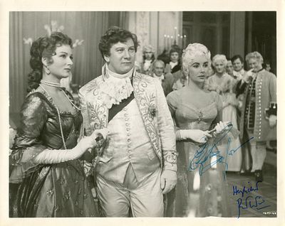 BEAU BRUMMELL: A good signed 10 x 8 photograph by both Elizabeth Taylor (Lady 