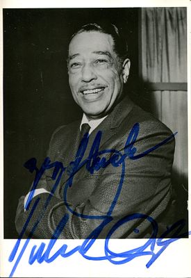 ELLINGTON DUKE: (1899-1974) American jazz composer and pianist. Signed 4 x 6 postcard photograph 