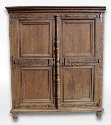 Gothic furniture in oak, Renaissance influences visible in the baluster-shaped broker 