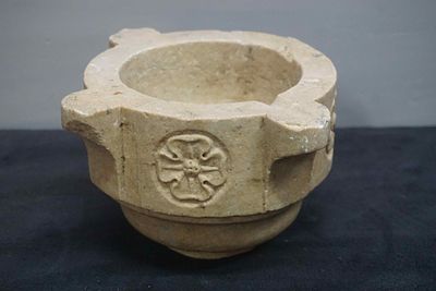 Marble mortar, decorated with a floral motif, damaged. 18th century H13x22