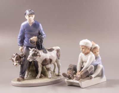 פיגורות פורצלן, רויאל קופנהגן. לוט 2 פיגורות פורצלן תוצרת Royal Copenhagen, בדמות איש עם פרות 