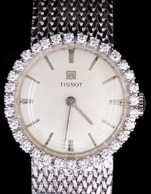 שעון יד לאישה, Tissot. שעון יד מכאני לאישה תוצרת Tissot. קופסה ורצועה עשויים זהב לבן 14K. משובץ 