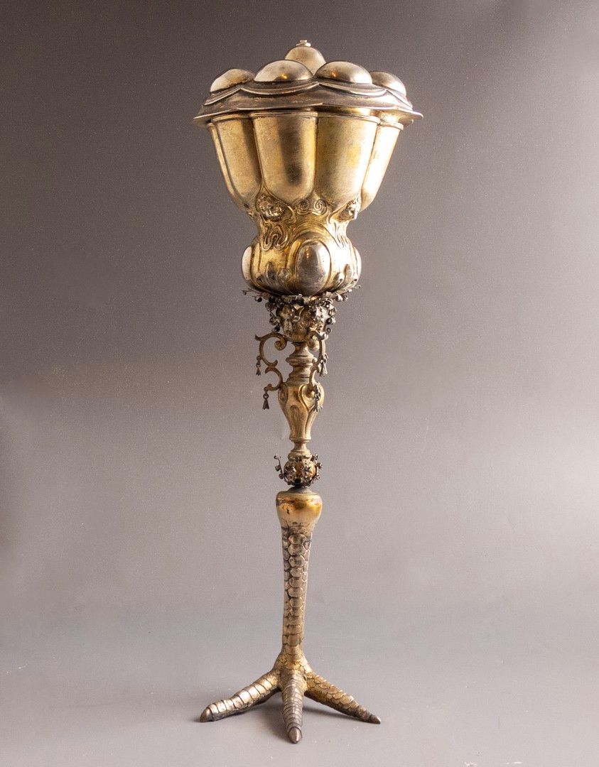 German Silver Goblet. German silver lidded goblet. Decorated with reliefs and lion heads. The 