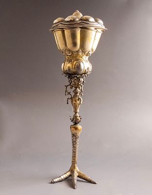 German Silver Goblet. German silver lidded goblet. Decorated with reliefs and lion heads. The 
