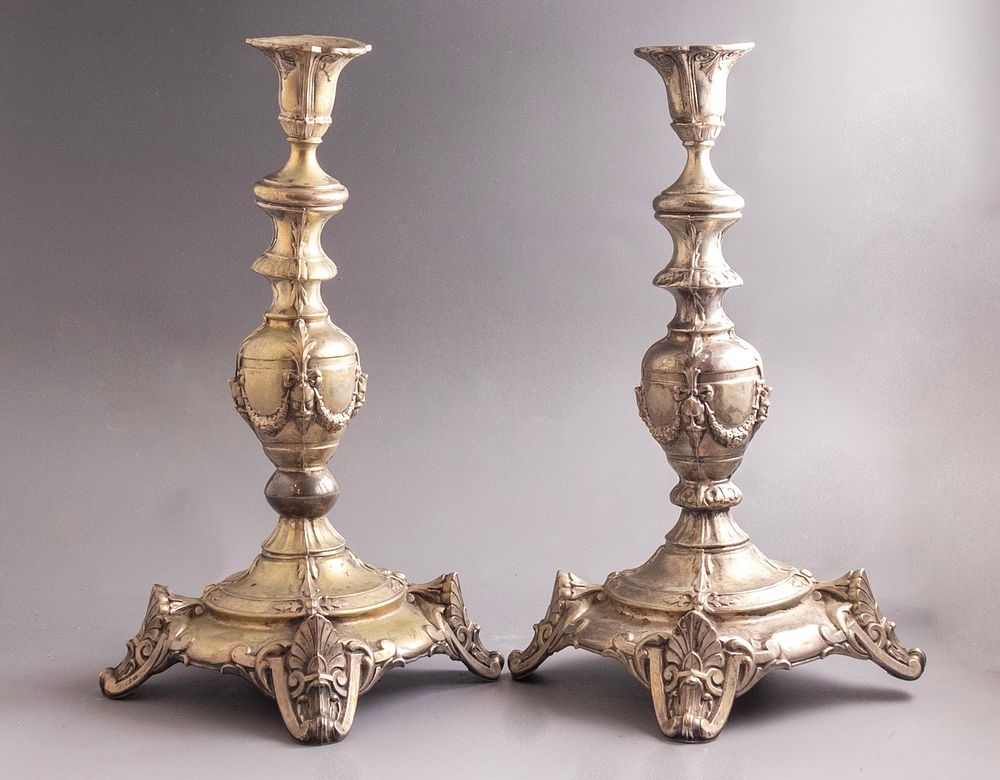 European Silver Candlesticks. Pair of European silver candlesticks, circa 1900. Embossed with 