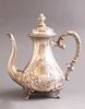 Austro-Hungarian silver kettle. An Austro-Hungarian silver kettle, decorated with reliefs of Image - 1