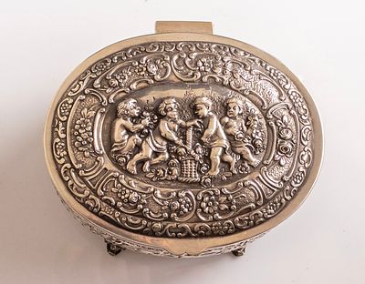 European Silver Box. European sterling silver box, embossed with Putti figures and floral