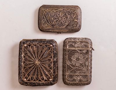 Silver Boxes. Lot of 3 silver boxes, decorated with filigree work of floral motifs. Dimensions: