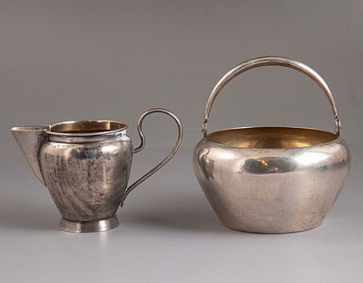 Russian Silver Items. Lot of 2 Russian silver items including a sugar bowl and a creamer. 