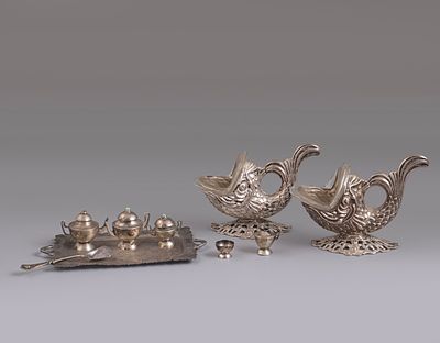Silver Items. Lot of silver items, including a pair of salt cellars and a miniature coffee set. 