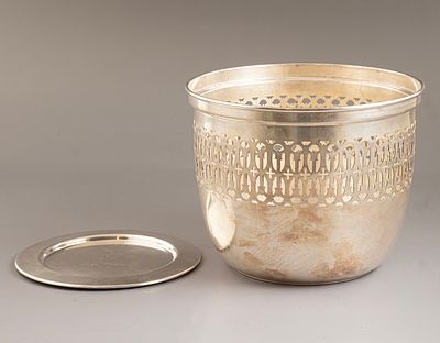 Silver Items, Cartier. Lot of 2 sterling silver items. Including a bowl / flower holder with 