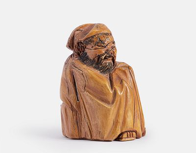 Carved Chinese Figurine. Chinese figurine, carved in the form of a monk. Height: 7 cm. Signed. 