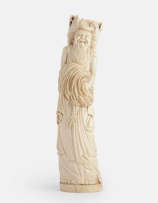 Carved Japanese Okimono. Large Japanese okimono, carved in the form of a farmer with stalks. 
