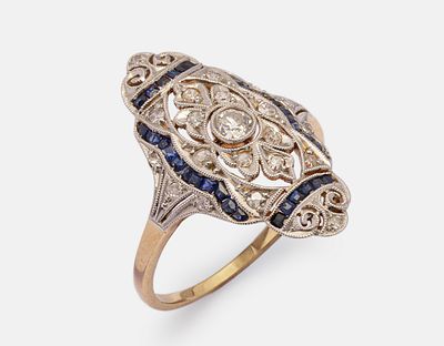 Gold Diamond & Sapphire Ring. 18K Art Deco gold ring, set with a central diamond weighing about 