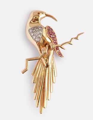Gold, Ruby & Diamond Brooch. 18K gold brooch shaped as a bird, set with 14 rubies and 12 