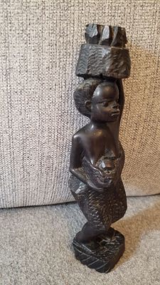 A very high quality African statue, carved in wood by hand. Height - 21.5 cm