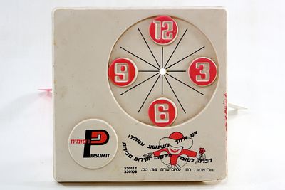 שעון פרסומי עשוי פלסטיק שנות השישים