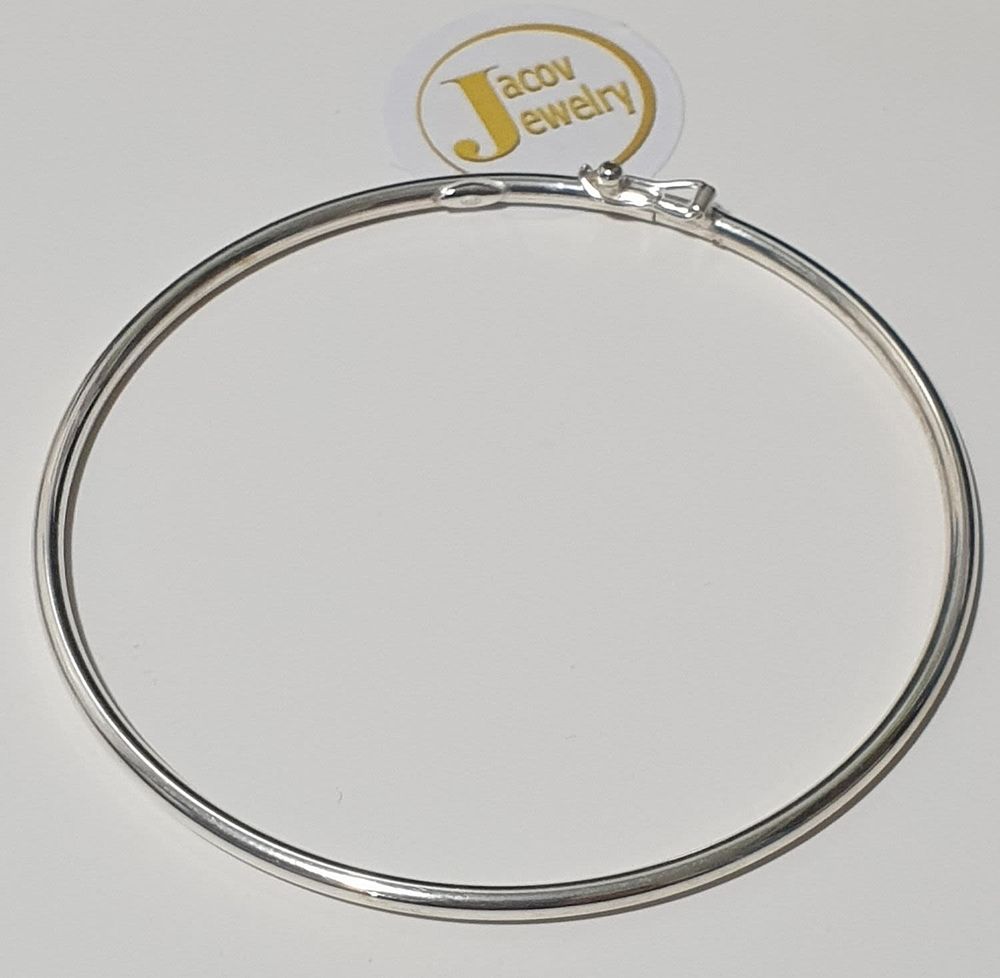 925 silver bracelet, hard, special clasp, 
diameter 65 mm, new.... 925 silver bracelet, hard 