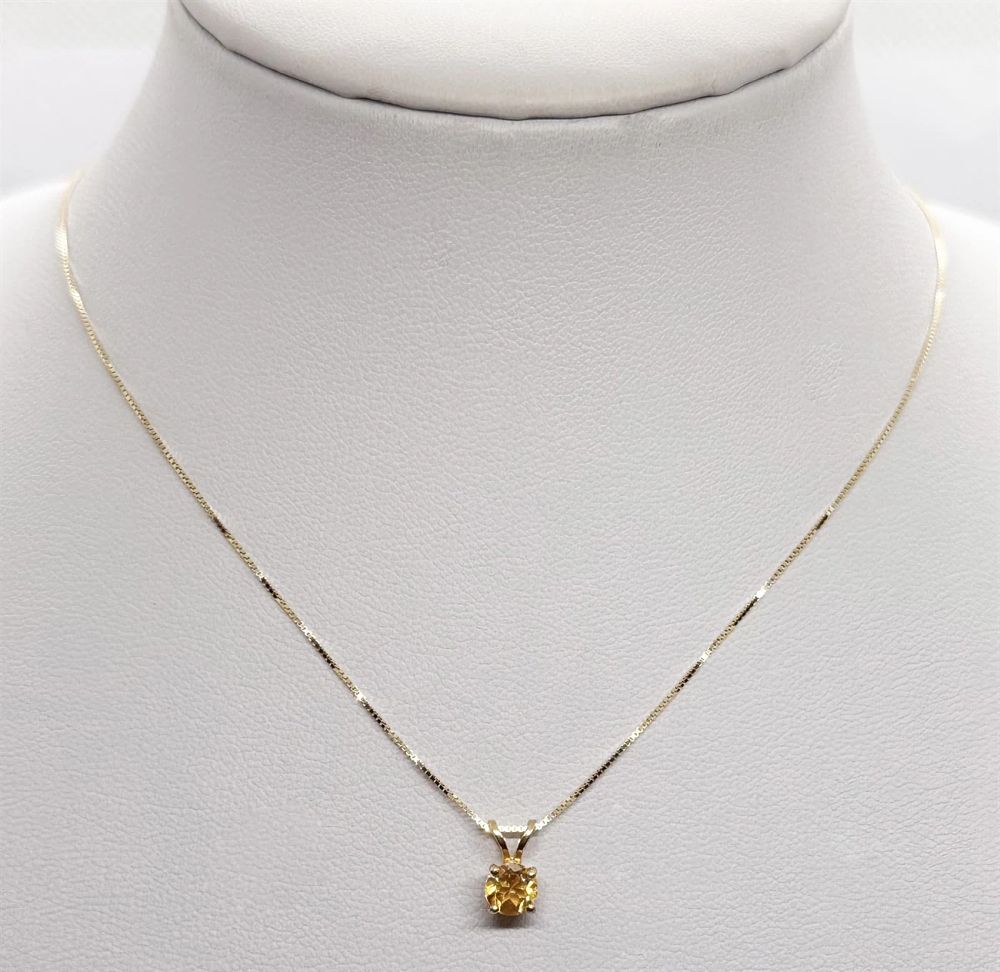 New 14K yellow gold citrine stone solitaire necklace and pendant.... Gold metal 
Purity: 14K 