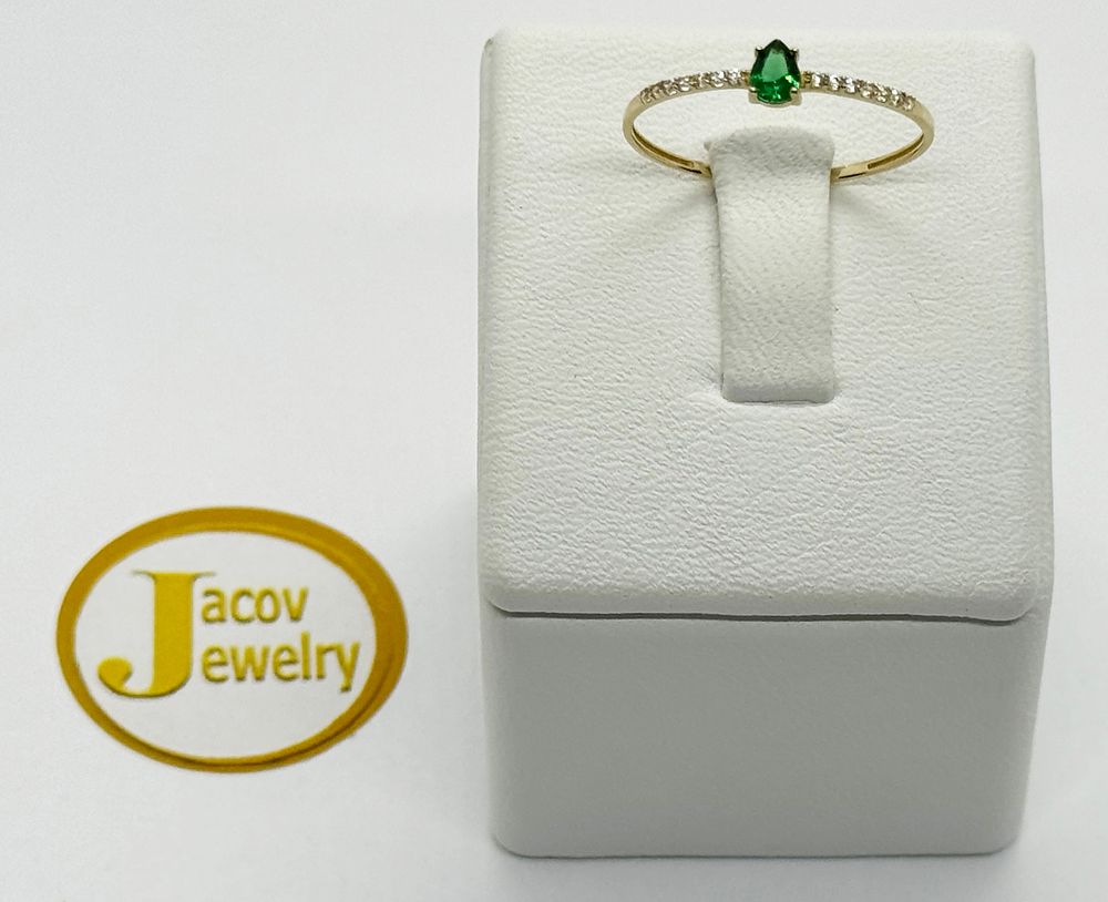 Green drop model ring inlaid with new 14K yellow gold zircon stones.... Gold metal 
Purity: 14K 