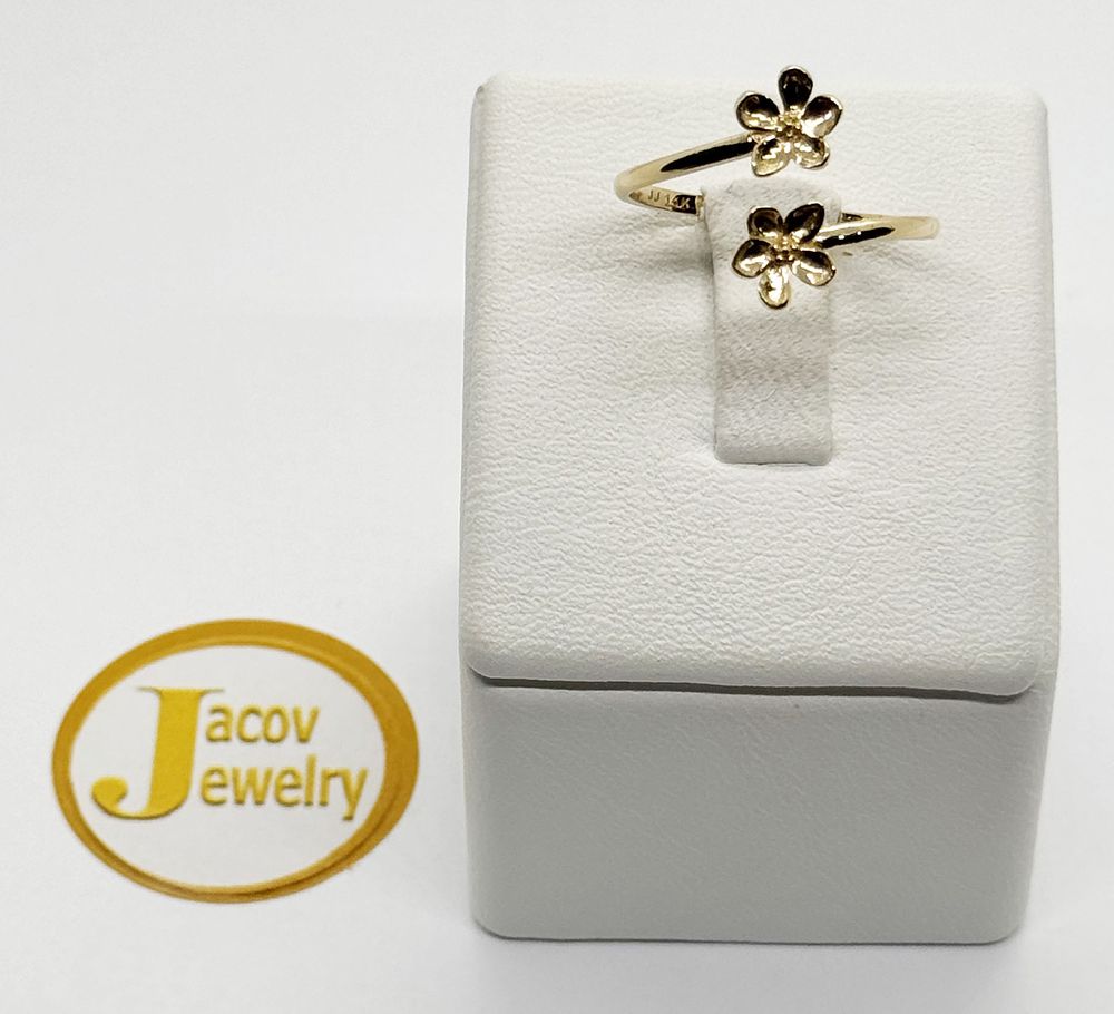 New 14K yellow gold flower model flexible open ring.... Gold metal 
Purity: 14K 
Color: Yellow 