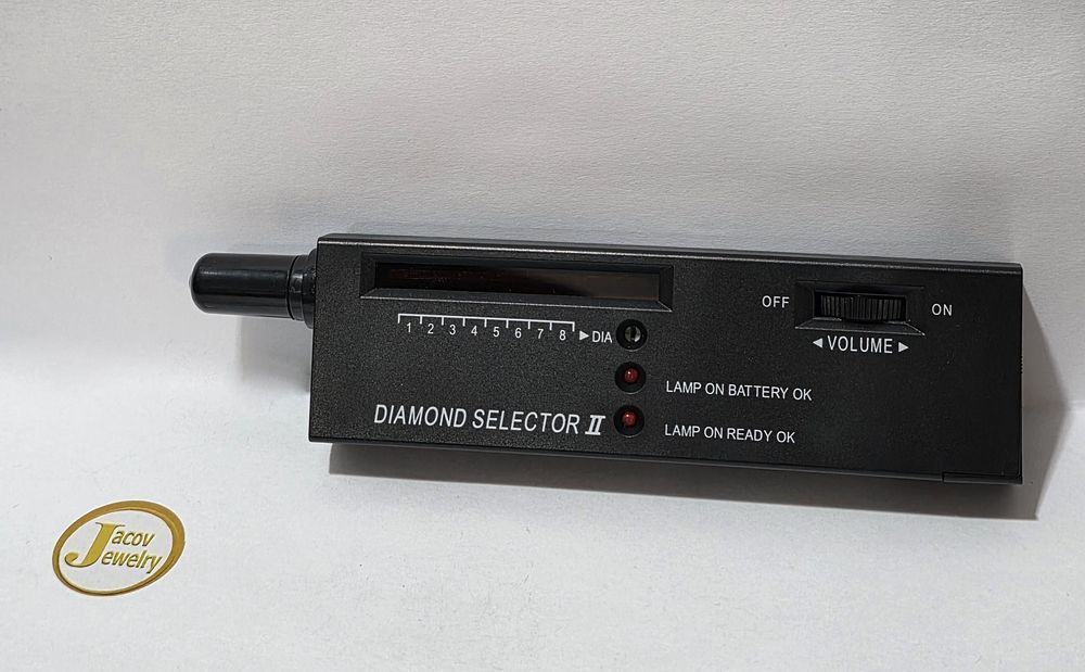 Electronic diamond tester including battery, new.... The tester body comes in black/gray 