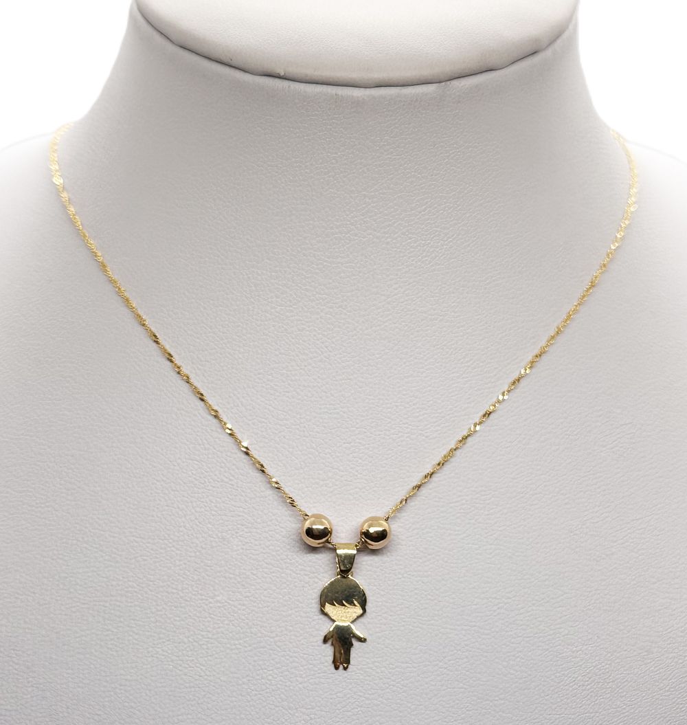 שרשרת ותליון דגם ילד כולל חרוזים בזהב צהוב 14K חדשים.... מתכת זהב 
אורך שרשרת: 
45 ס"מ 
