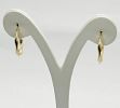 Pair of hoop earrings in snake skin design 
Diameter 20 mm in 14K yellow gold new.... A pair of 