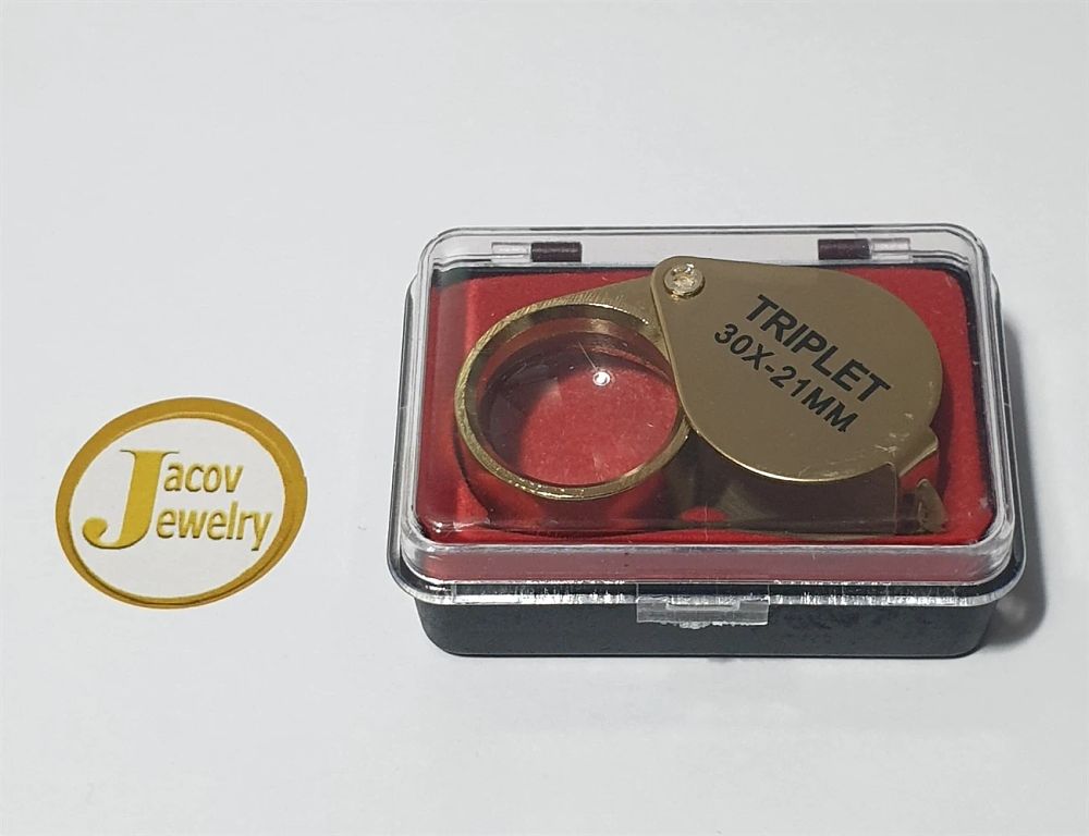 30x gold loupe, new in box.... 30X Gold-Colored Magnifier 
*30X - 21MM 
*For Jewelers and 