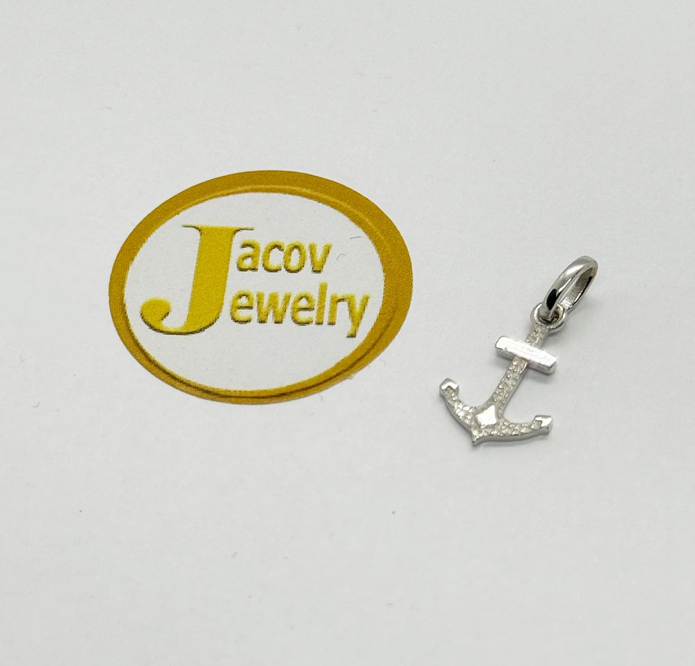 New 14K white gold anchor model pendant.... Gold metal 
Purity: 14K 
Color: White 
Pendant 