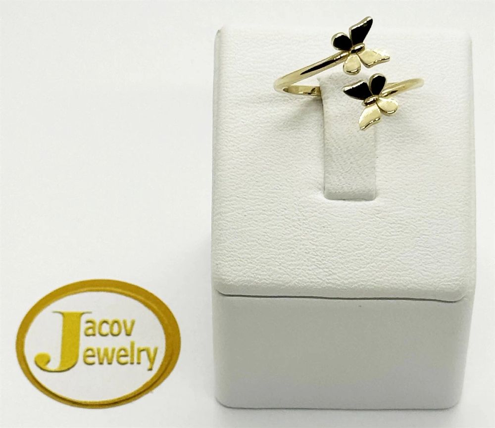A flexible open ring with a butterfly model in a special design 
New 14K yellow gold.... Gold 